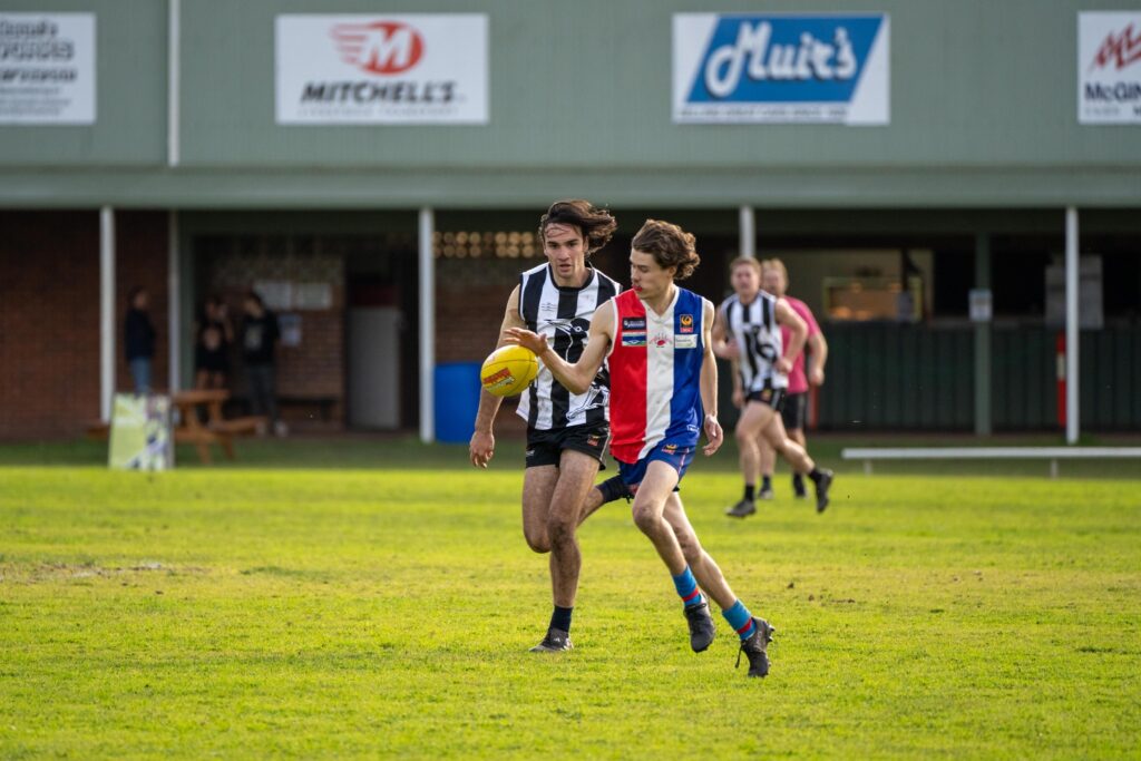 Action from a 2023 match between Southerners and Imperials in the Lower South West Football League.